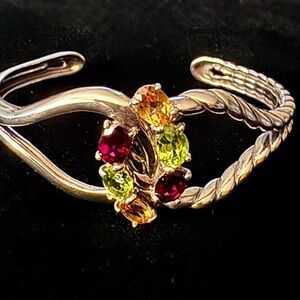 Carolyn Pollack Ruby, citrine, and Peridot sterling silver cuff bracelet.